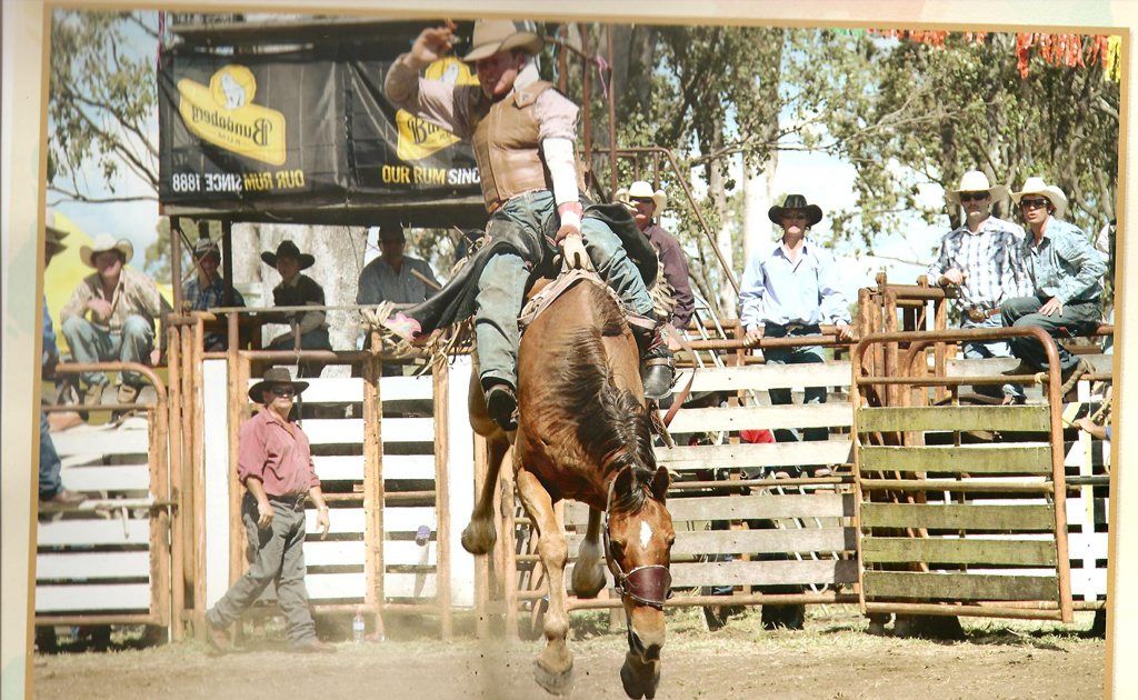 RODEO DEBATE: Onlookers watch on as a man and horse participate in the Mulgidie Rodeo. PHOTO: Contributed RODEO DEBATE: Onlookers watch on as a man and horse participate in the Mulgidie Rodeo. PHOTO: Contributed
